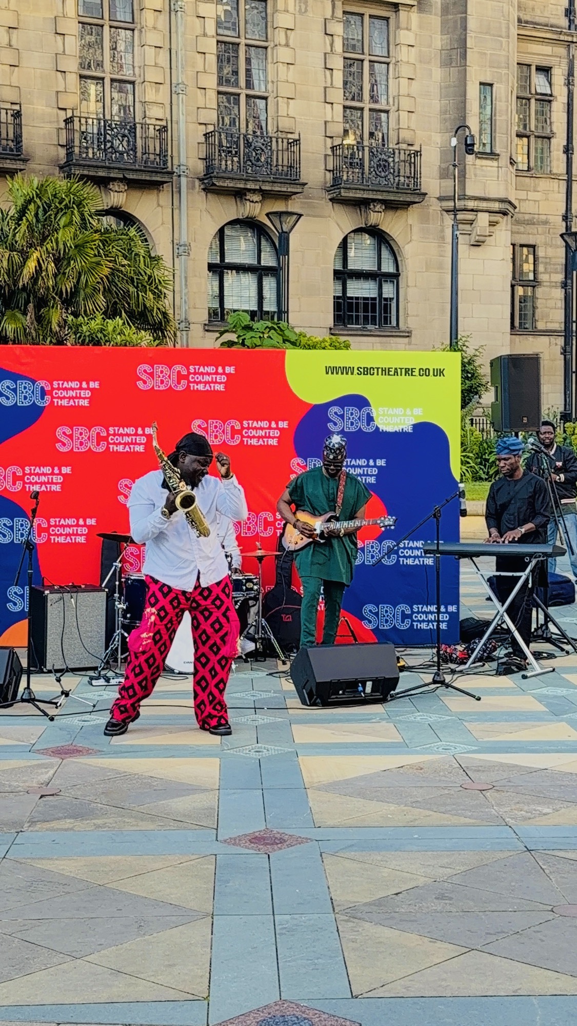 Live Afro-fusion saxophone at the Eco Art Fashion Show.